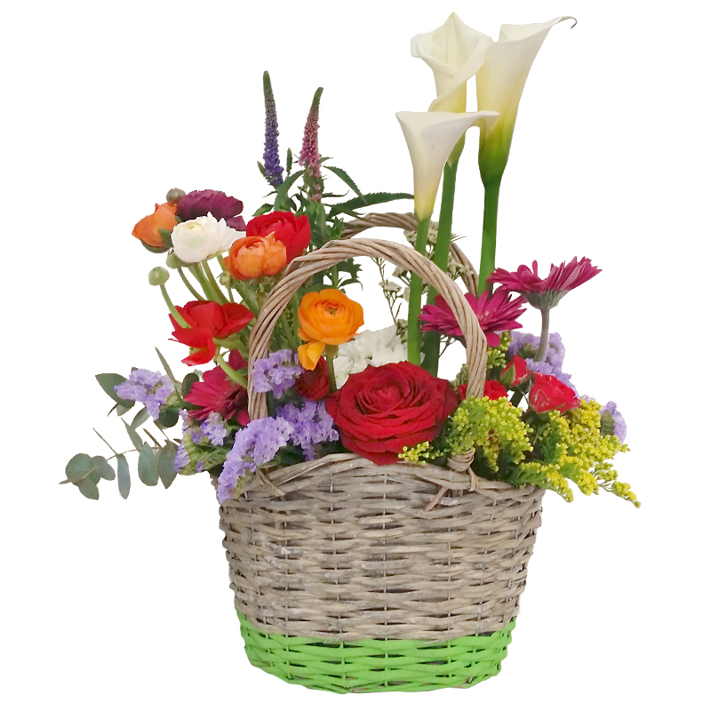 Composition in a basket with a variety of  spring flowers